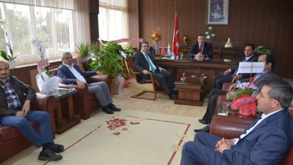 Mersin AK Parti İl başkanı ve Yönetim Kurulu Üyeleri İl Milli Eğitim Müdürümüz Adem Kocaya Hayırlı Olsun Ziyaretinde Bulundular